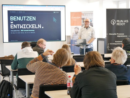 Vortrag „Benutzen ist Entwickeln“ beim AI Camp